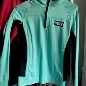 A beautiful turquoise zip up sweater from PINK